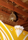 An ornamental wood ceiling with classical lamp in the palace of bangalore.