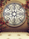 Ornamented window with rose vines Royalty Free Stock Photo