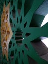The ornaments inside the mosque to enter the light, are made of concrete painted green and gold Royalty Free Stock Photo