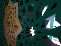 The ornaments inside the mosque to enter the light, are made of concrete painted green and gold Royalty Free Stock Photo