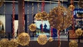 Ornaments and lights in the shopping center. Christmas decorations on the holiday. Colorful balls garland glowing lamps. Royalty Free Stock Photo