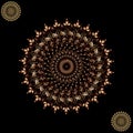 Ornaments mandala design with black background on gold color.