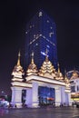 Ornat gate near shopping mall at night, Kunming, China