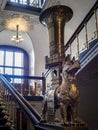 Ornate animal and tower statue on staircase