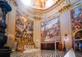 The ornate, baroque interior chapel and dome of the Basilica of Sant`Andrea della Valle in the historic center of Rome, Italy