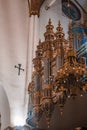 Baroque Organ, plus a Crucifix, within a Historic Cathedral in Latvia