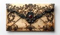 Ornate Beige and Bronze Envelope with Floral Decoration on White Background Royalty Free Stock Photo