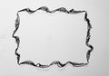 Ornate black doodle frame on a white background. The frame Royalty Free Stock Photo