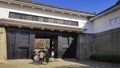 The ornate black and white Otemon entrance gate of Osaka Castle