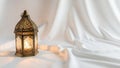 Ornate brass lantern with intricate cut out patterns casting a Royalty Free Stock Photo