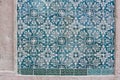 Ornate brightly colored portugese tile texture in blue green and white