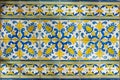 Ornate brightly colored Portugese tile texture in blue and yellow Royalty Free Stock Photo