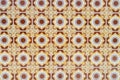 Ornate brown and yellow ceramic tile pattern Royalty Free Stock Photo