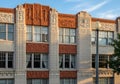 Ornate building facade featuring intricate terracotta and stone reliefs. The design includes Royalty Free Stock Photo