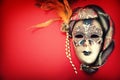 Ornate carnival mask over red background Royalty Free Stock Photo