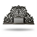 A cast iron fireplace grate Royalty Free Stock Photo