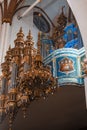 Elegant Chandelier with Organ Inside the Latvian Cathedral's Interior