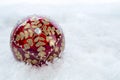 Ornate Christmas Bauble With Snow Royalty Free Stock Photo