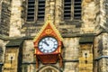 The ornate clock on the exterior of St. Nicholas Cathedral, or Newcastle Cathedral in the historic city of Newcastle Royalty Free Stock Photo