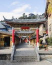 Ornate colorful gate built in traditional Chine style Lijiang old town Yunnan China