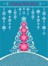 Ornate craft blue Christmas greeting card with white paper cut out hanging decoration, decorative xmas tree and lacy background Royalty Free Stock Photo