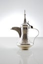 An ornate dallah which is a metal pot for making Arabic coffee Royalty Free Stock Photo