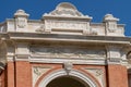 The ornate decorative arch entrance to the covered market in Piazza Andrea Costa, Ravenna,