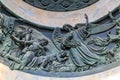 Ornate details of bronze ornaments on facade above gates of Saint Isaac`s Russian Orthodox Cathedral in Saint Petersburg, Russia