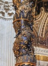 Ornate details of a column of Bernini's Baldacchino Altar in Saint Peter's Basilica in Vatican City, Vatican Royalty Free Stock Photo