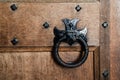 Ornate Door Handle on a Wooden Door Royalty Free Stock Photo