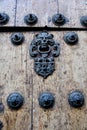 Ornate door knocker details on a door at Sucre Metropolitan Cathedral, Sucre, Bolivia