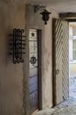 Ornate door and lantern in passageway Royalty Free Stock Photo