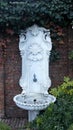 Ornate, embossed marble fountain Royalty Free Stock Photo