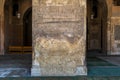 Ornate engraved stone wall with ruined floral patterns at Ibn Tulun Mosque, Cairo, Egypt Royalty Free Stock Photo