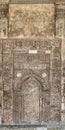 Ornate engraved stone wall with ruined floral patterns at Ibn Tulun Mosque, Cairo, Egypt Royalty Free Stock Photo