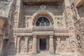 Ornate entrance of the Buddhist chaitya (prayer hall), cave 19, carved into a cliff in Ajanta, Maharasthra state, Ind Royalty Free Stock Photo