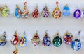 Ornate Faberge egg souvenir pendants in the official store at Faberge museum for tourists in Saint Petersburg Russia