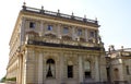 Ornate facade with arched windows, columns, & balustrade. Royalty Free Stock Photo