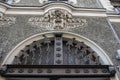 Ornate facade of a house with a head of a man in art nouveau style in Riga, Latvia Royalty Free Stock Photo