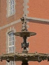 Ornate fountain with depiciton of child and fish