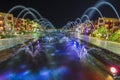 Ornate fountain lit up at night in luxury hotel resort Royalty Free Stock Photo