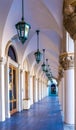 The ornate front doors and columned walkway of the front of the Venetian