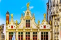 The ornate gable of the old Civil Registrar building of the Brugse Vrije on the Burg Square in city of Bruges, Belgium