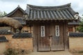 Ornate gate entrance to a traditional home in the Hahoe Folk Village in South Korea Royalty Free Stock Photo
