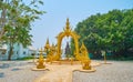 Ritual bell in golden arch of White Temple, Chiang Rai, Thailand