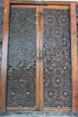 Ornate glass door of the main building of the Palace of Sheki Khans in Sheki, Azerbaijan