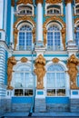 The ornate gold, blue and white exterior of Catherine`s Palace in Pushkin, St Petersburg, Russia