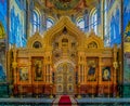 Ornate golden altar and icons of the Savior on Spilled Blood or Cathedral of Resurrection of Christ in Saint Petersburg, Russia