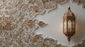 Ornate golden lantern with intricate patterns on an elaborate decorative wall, showcasing elegant Middle Eastern design elements. Royalty Free Stock Photo
