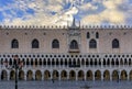 Ornate gothic facade of the famous Doge's Palace, symbol of Venice on St. mark's or San Marco square at sunrise, Italy Royalty Free Stock Photo